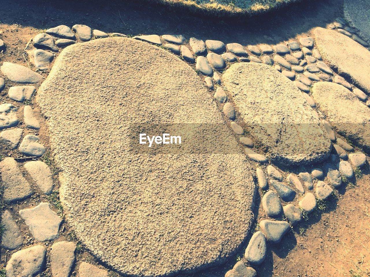 CLOSE-UP OF SAND AT BEACH