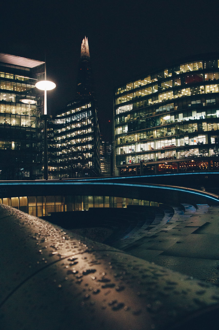 ILLUMINATED BUILDINGS AT NIGHT