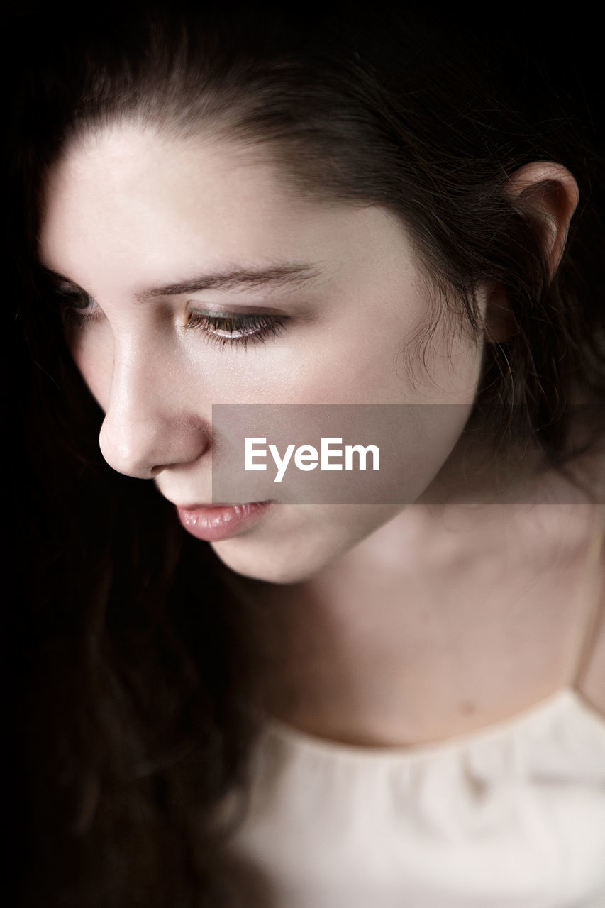 High angle view of young woman looking away