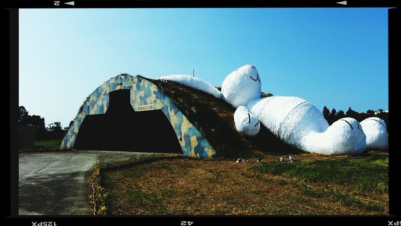 OLD BUILT STRUCTURE AGAINST CLEAR BLUE SKY