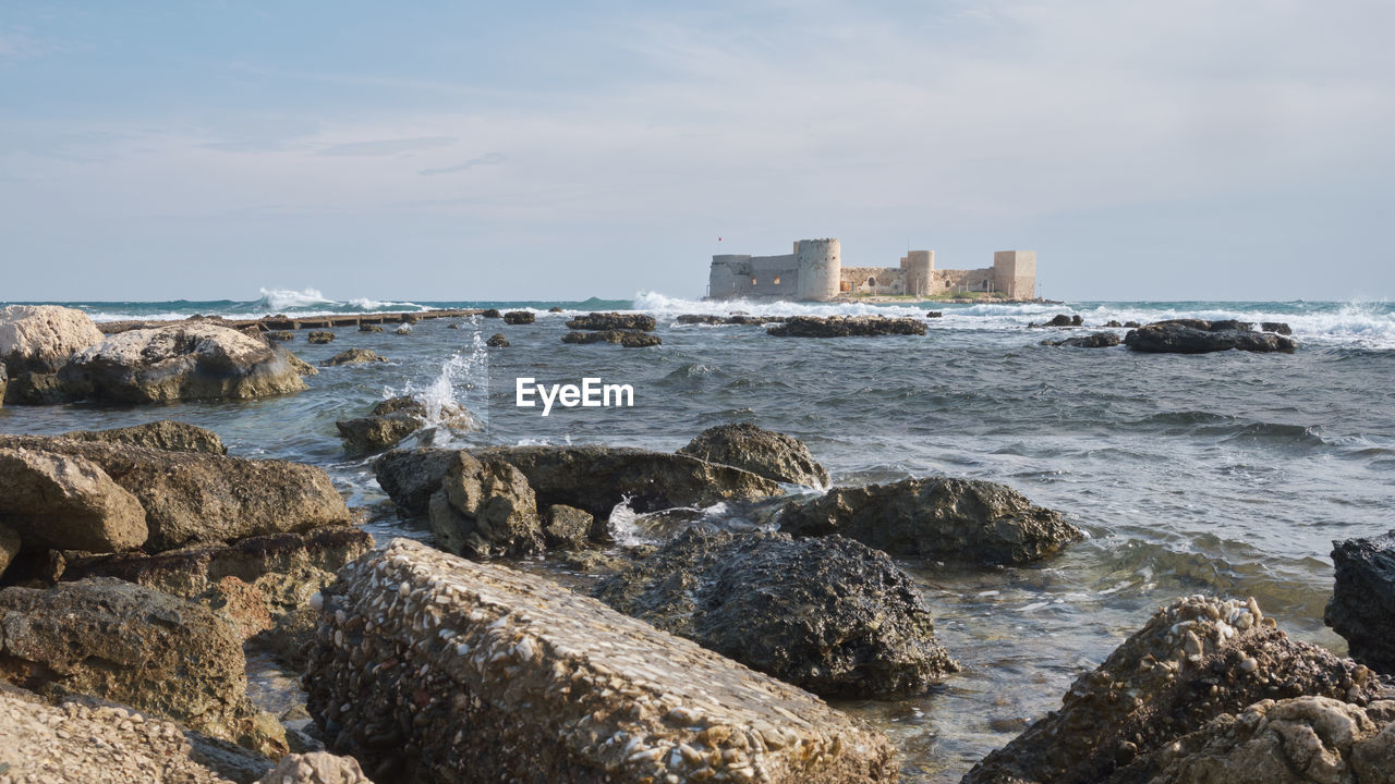 Ancient fortress kizkalesi or maiden castle on island in mediterranean sea. mersin province, turkey