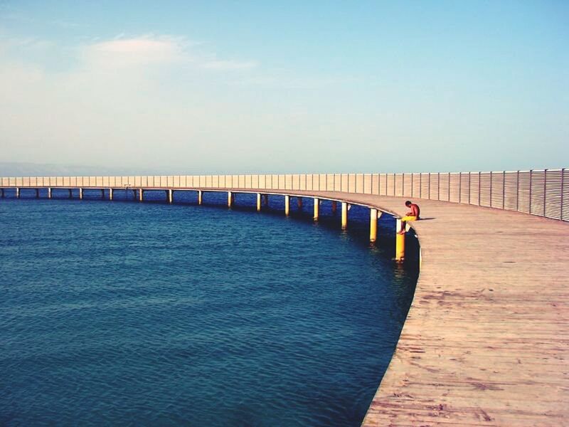 VIEW OF BRIDGE OVER SEA