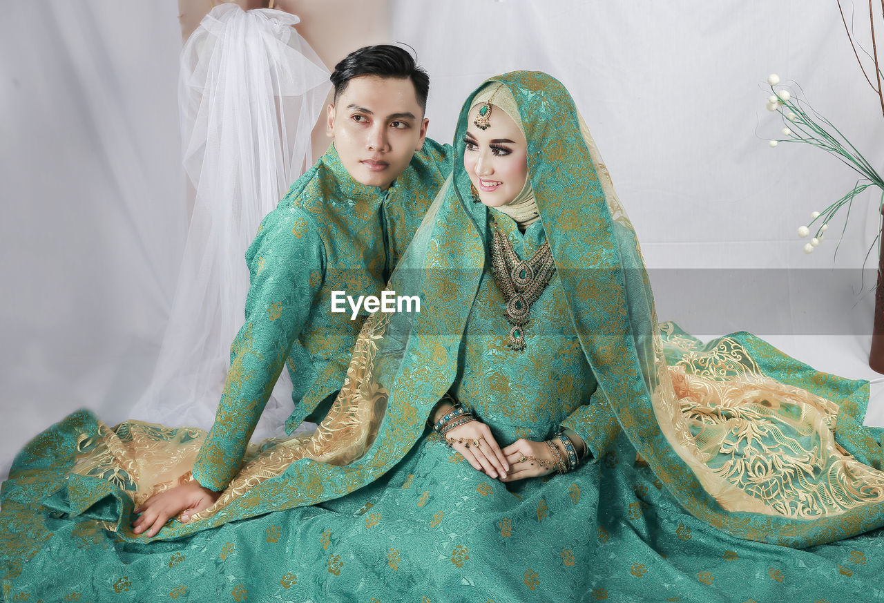 Photo of a bride and groom in indian wedding attire