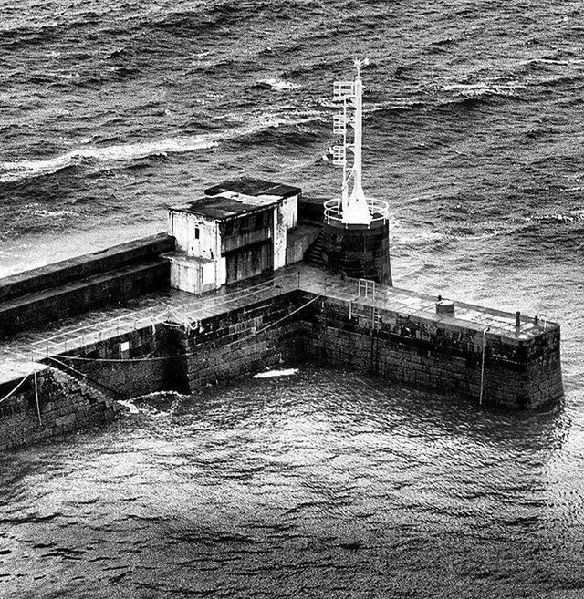 VIEW OF PIER IN SEA