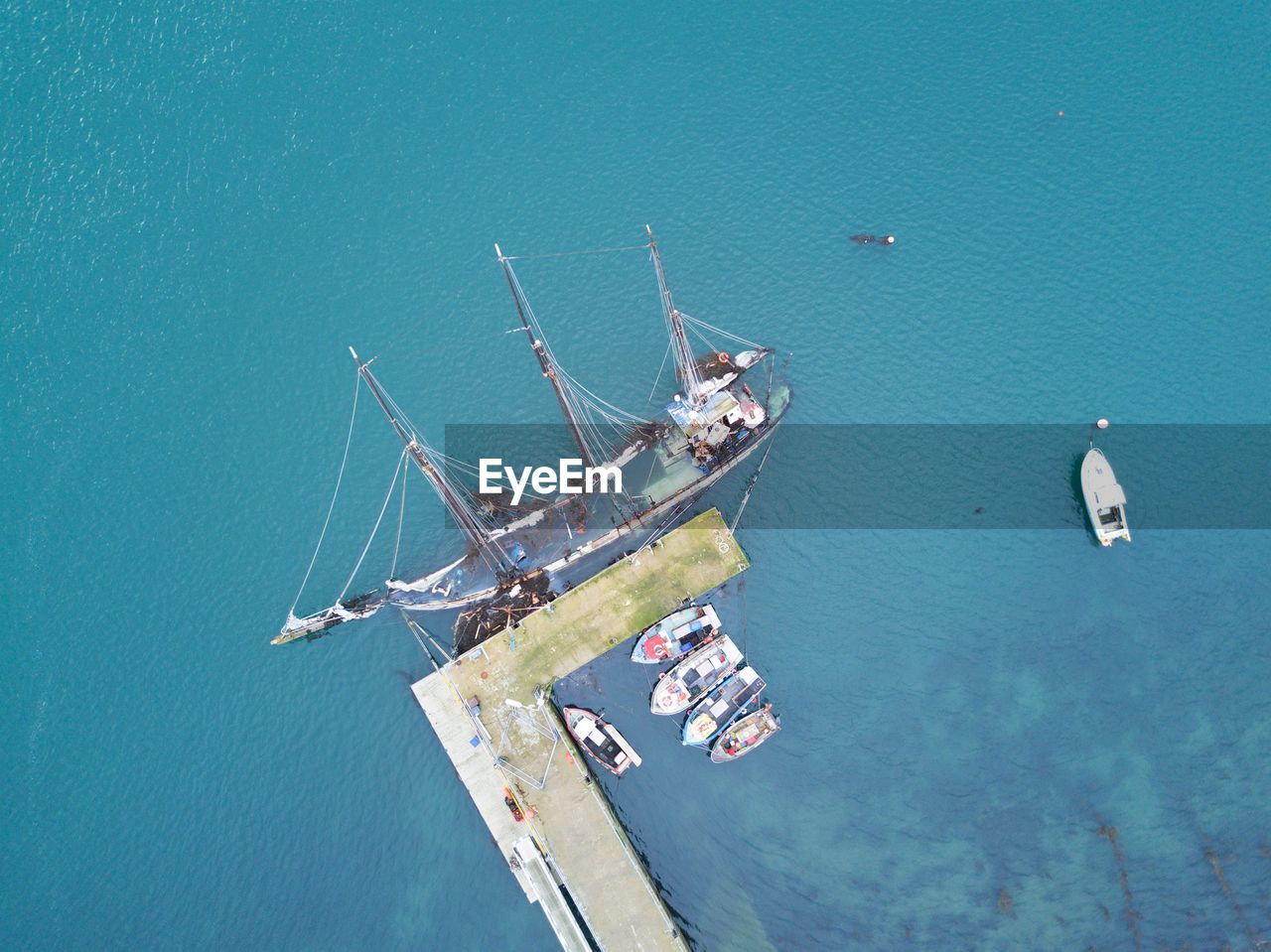 High angle view of ship sailing in sea against sky