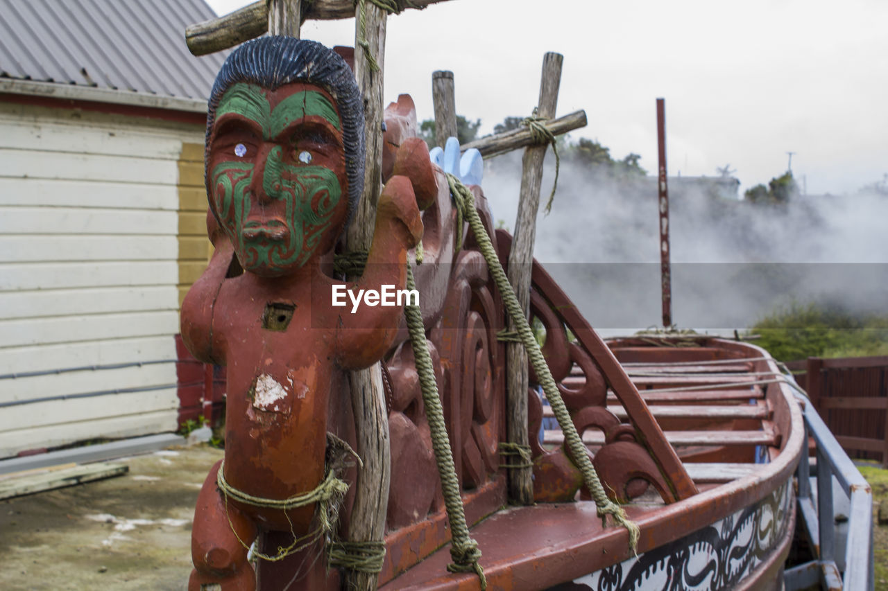 Traditional maori wood carved canoe