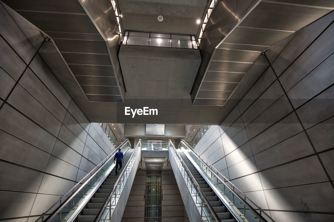 HIGH ANGLE VIEW OF ESCALATOR