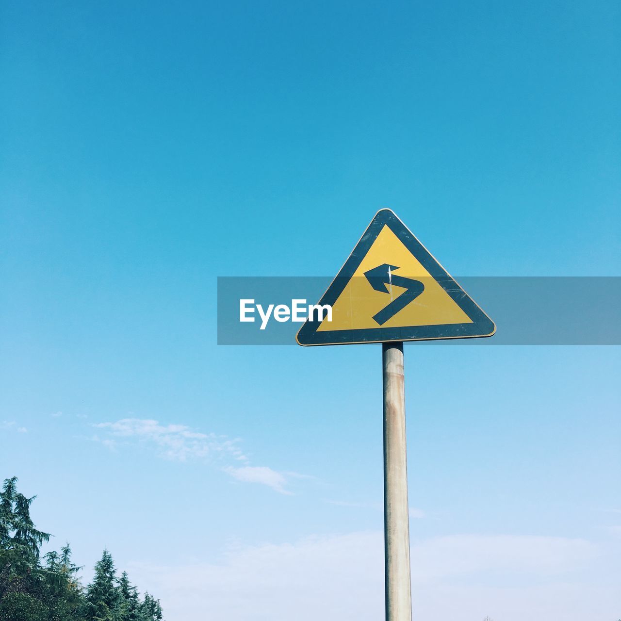 LOW ANGLE VIEW OF ROAD SIGN AGAINST CLEAR SKY