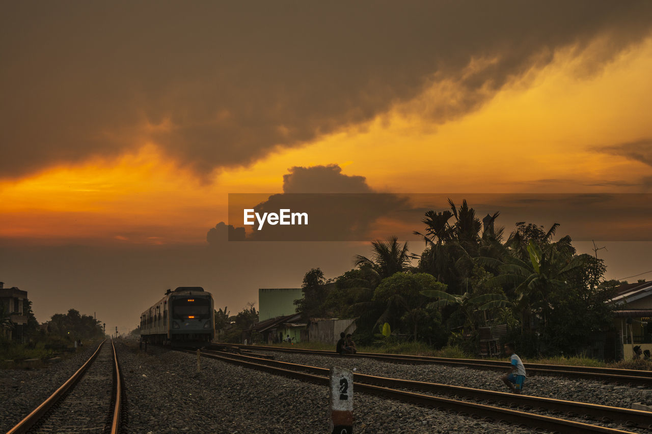 Train against sky during sunset