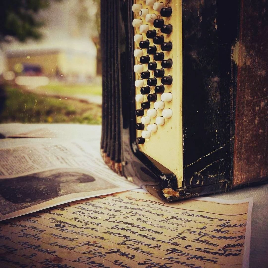 CLOSE-UP OF PIANO KEYS AT HOME