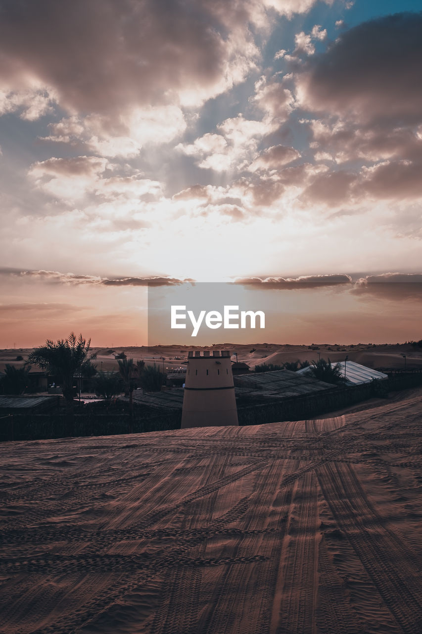 Scenic view of field against sky during sunset