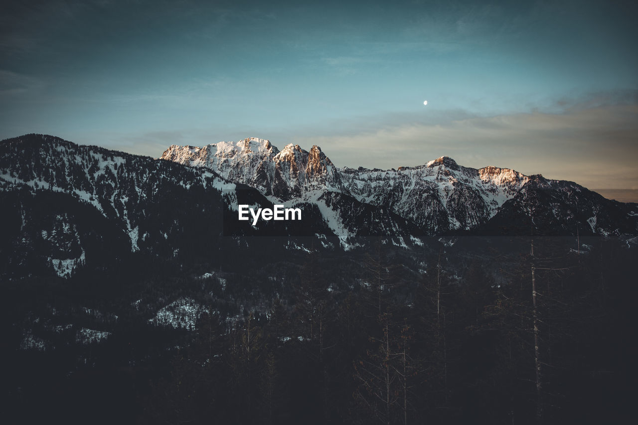 Scenic view of snow covered mountain range