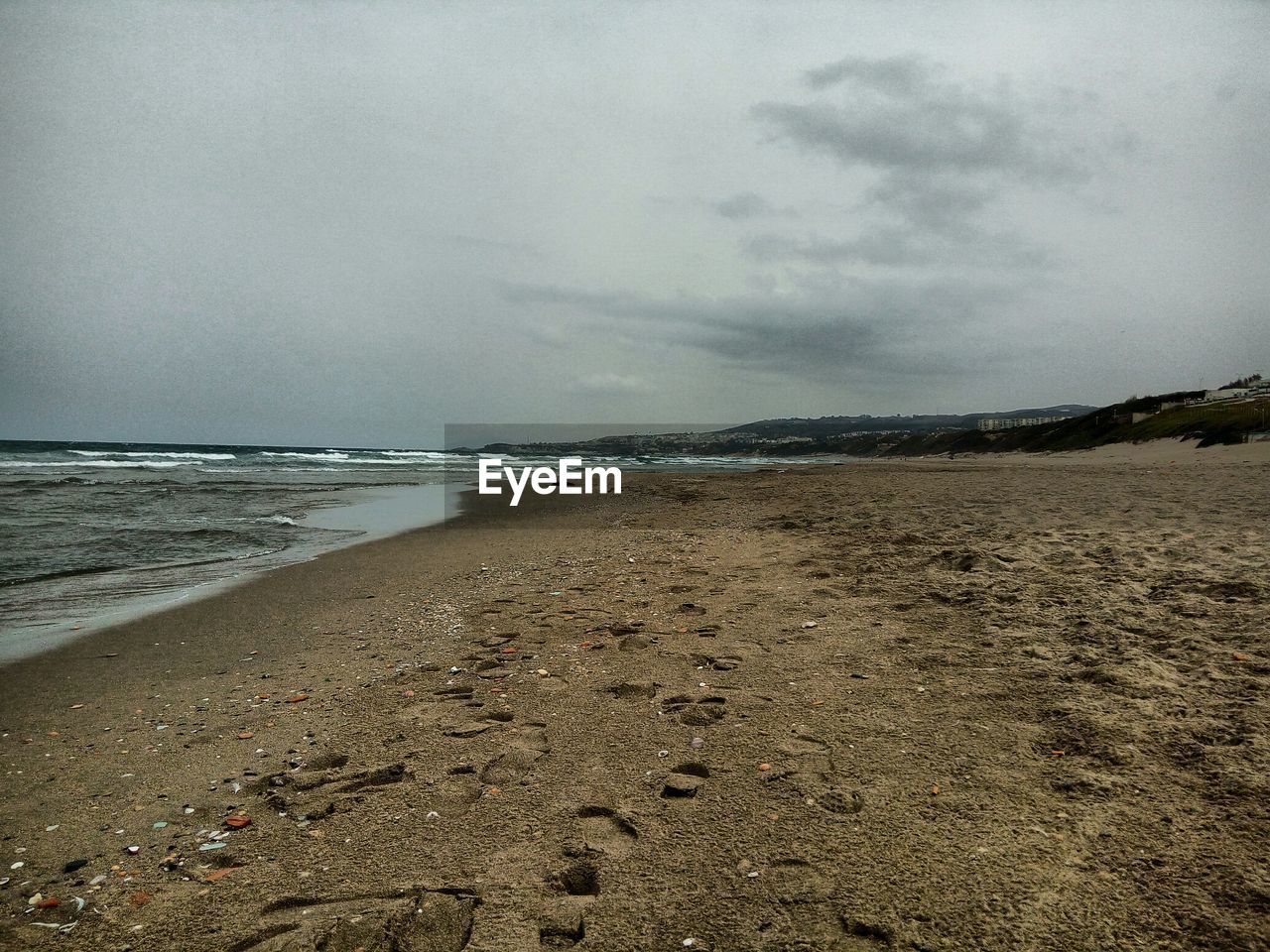 BEACH AGAINST SKY