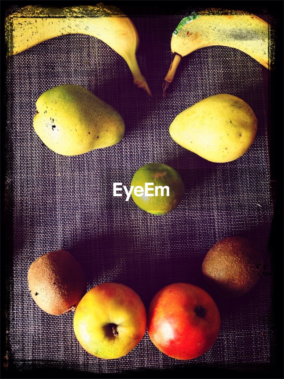 Smiley face made by assorted fruits