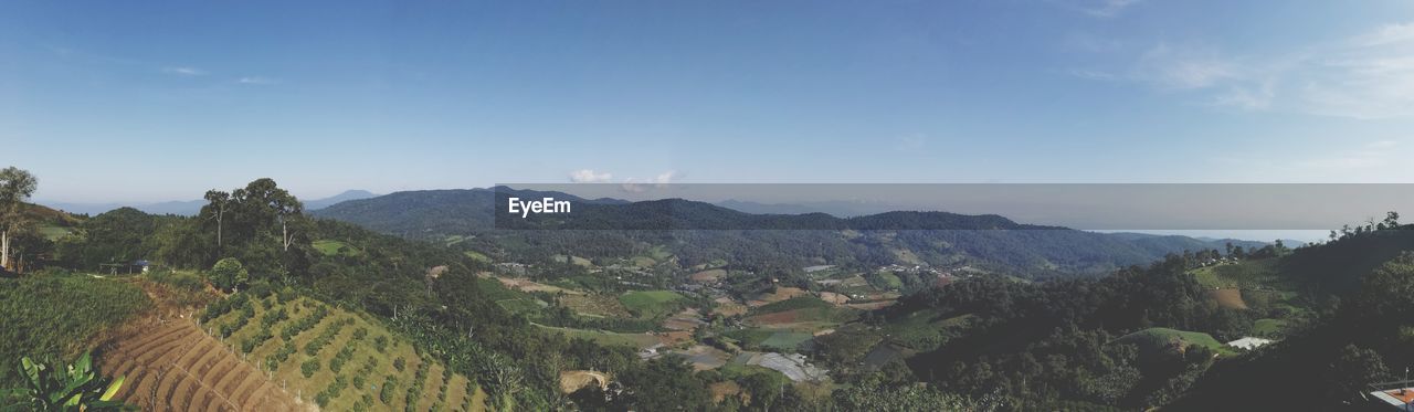 PANORAMIC VIEW OF LANDSCAPE AND MOUNTAINS AGAINST SKY