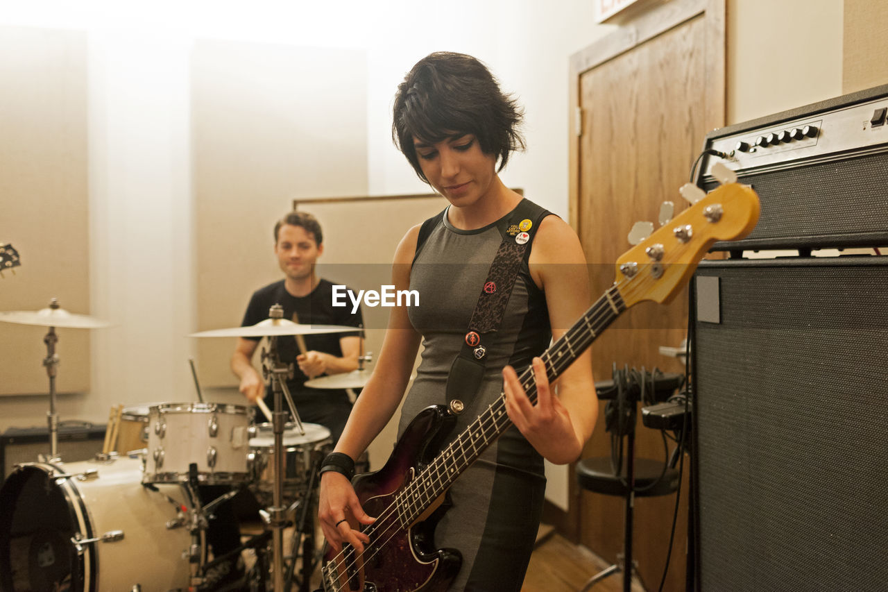 Young musicians practicing at a rehearsal space