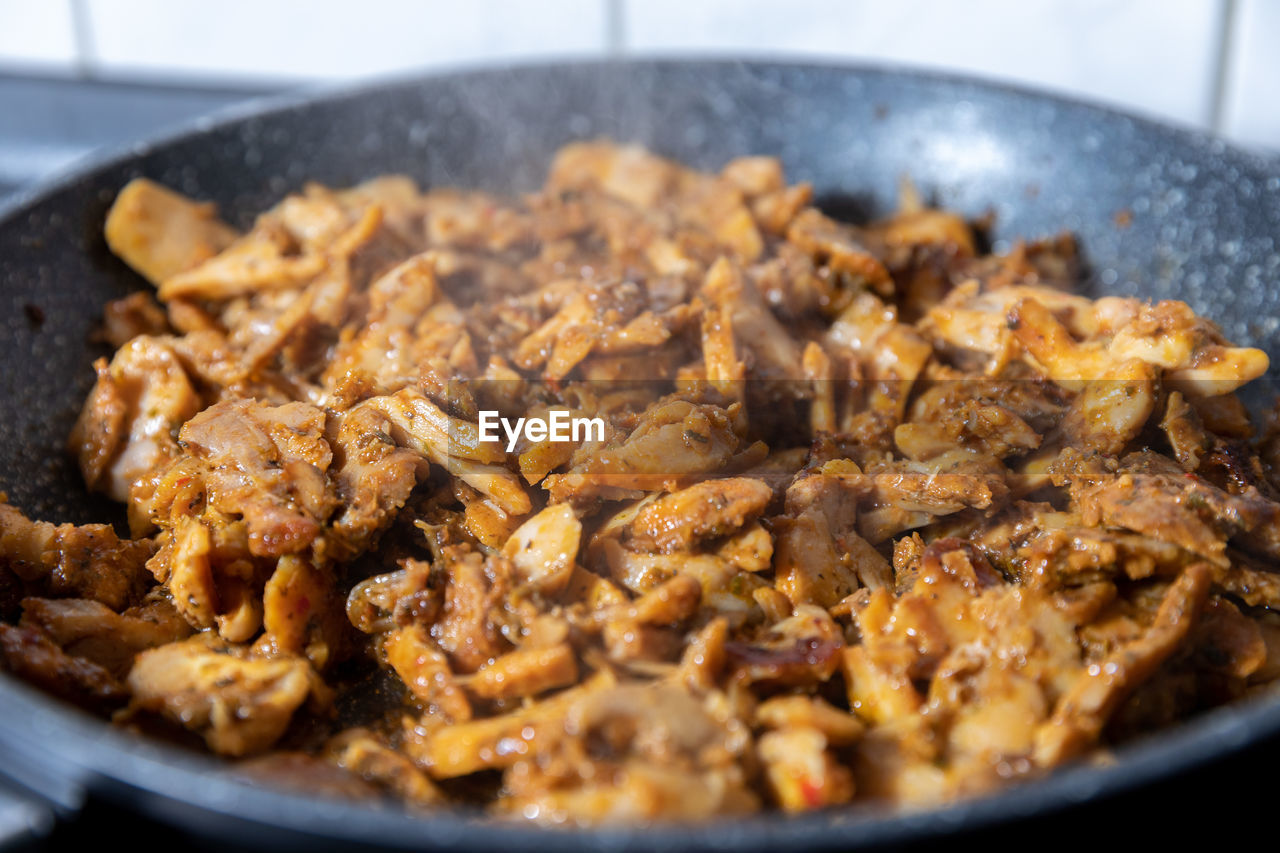 food, food and drink, dish, cooking pan, kitchen utensil, household equipment, meat, healthy eating, close-up, freshness, fried, no people, pan, cuisine, wellbeing, produce, heat, indoors, breakfast, frying pan, domestic room, kitchen, meal, selective focus