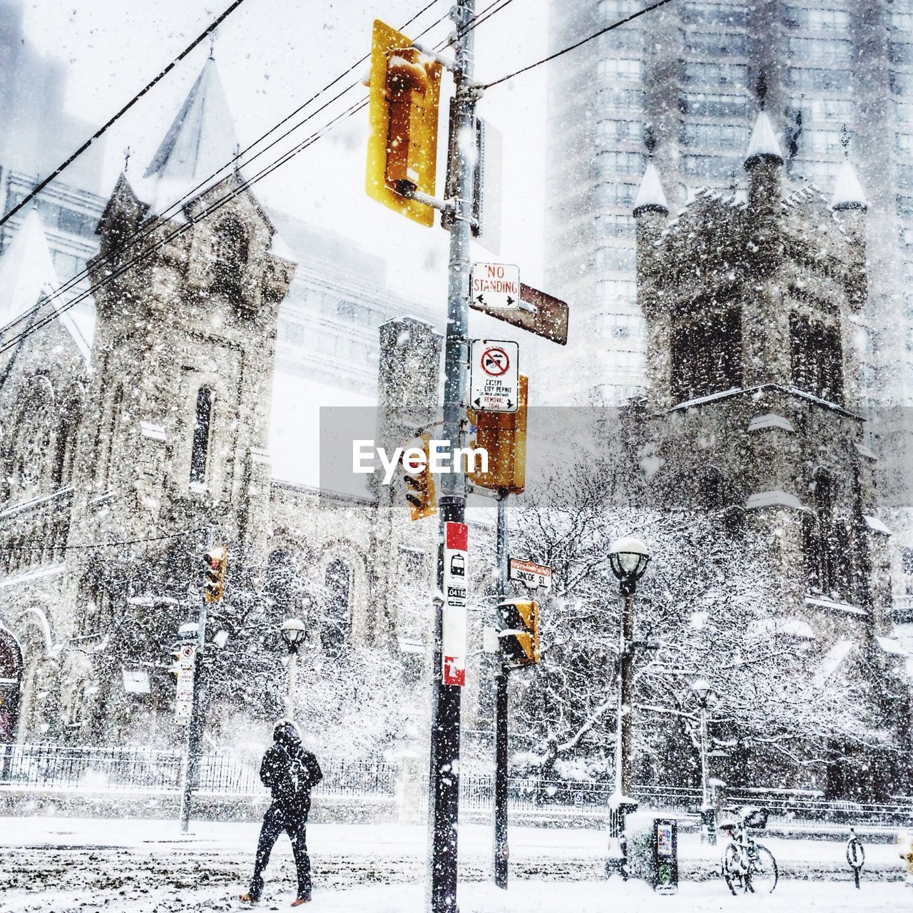 Buildings and street signs in snow