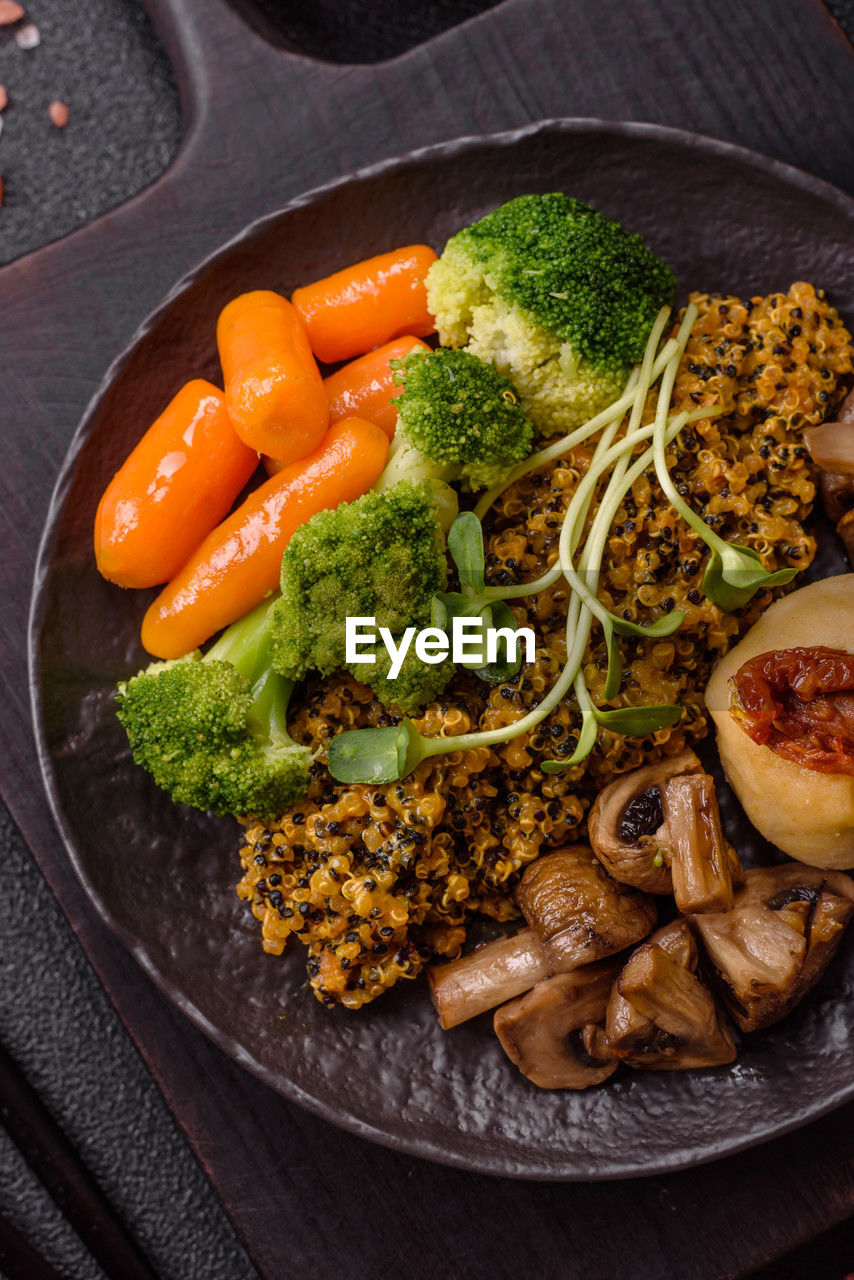 food, food and drink, vegetable, healthy eating, broccoli, wellbeing, green, freshness, dish, meal, produce, no people, carrot, cuisine, meat, root vegetable, indoors, studio shot, high angle view, herb, spice, fried, plate, vegetarian food, kitchen utensil