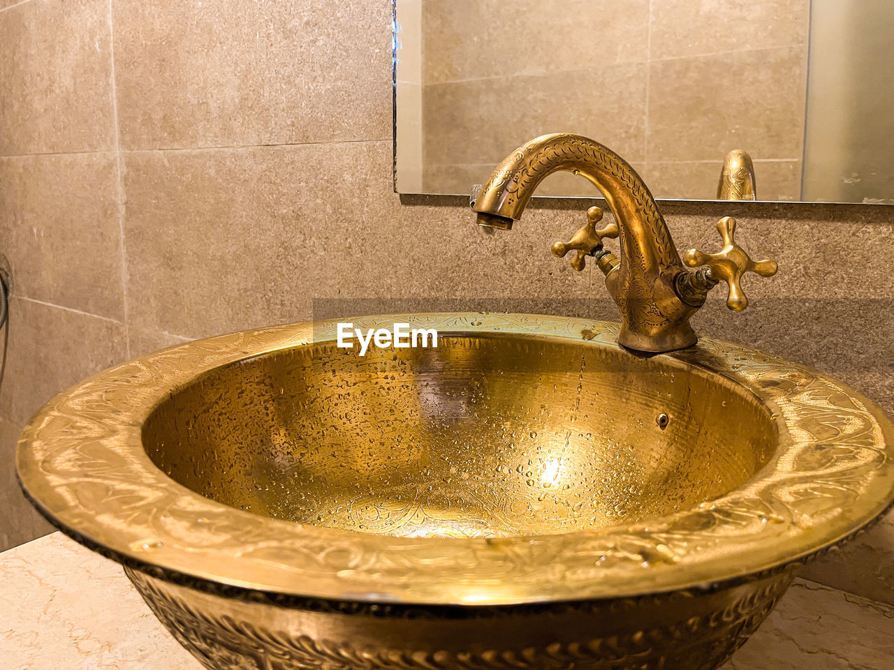 home, domestic room, faucet, bathroom, sink, household equipment, hygiene, domestic bathroom, plumbing fixture, home interior, metal, indoors, tap, flooring, wealth, luxury, wash bowl, tile, no people, container, nature, cleaning, household fixture, purity, water, room, architecture, home showcase interior, bathroom sink, close-up, washing, shiny, elegance