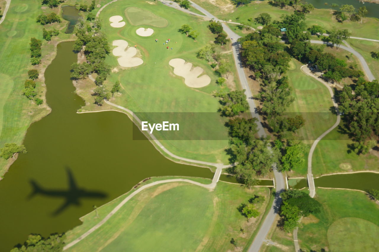 Aerial view of river and green landscape