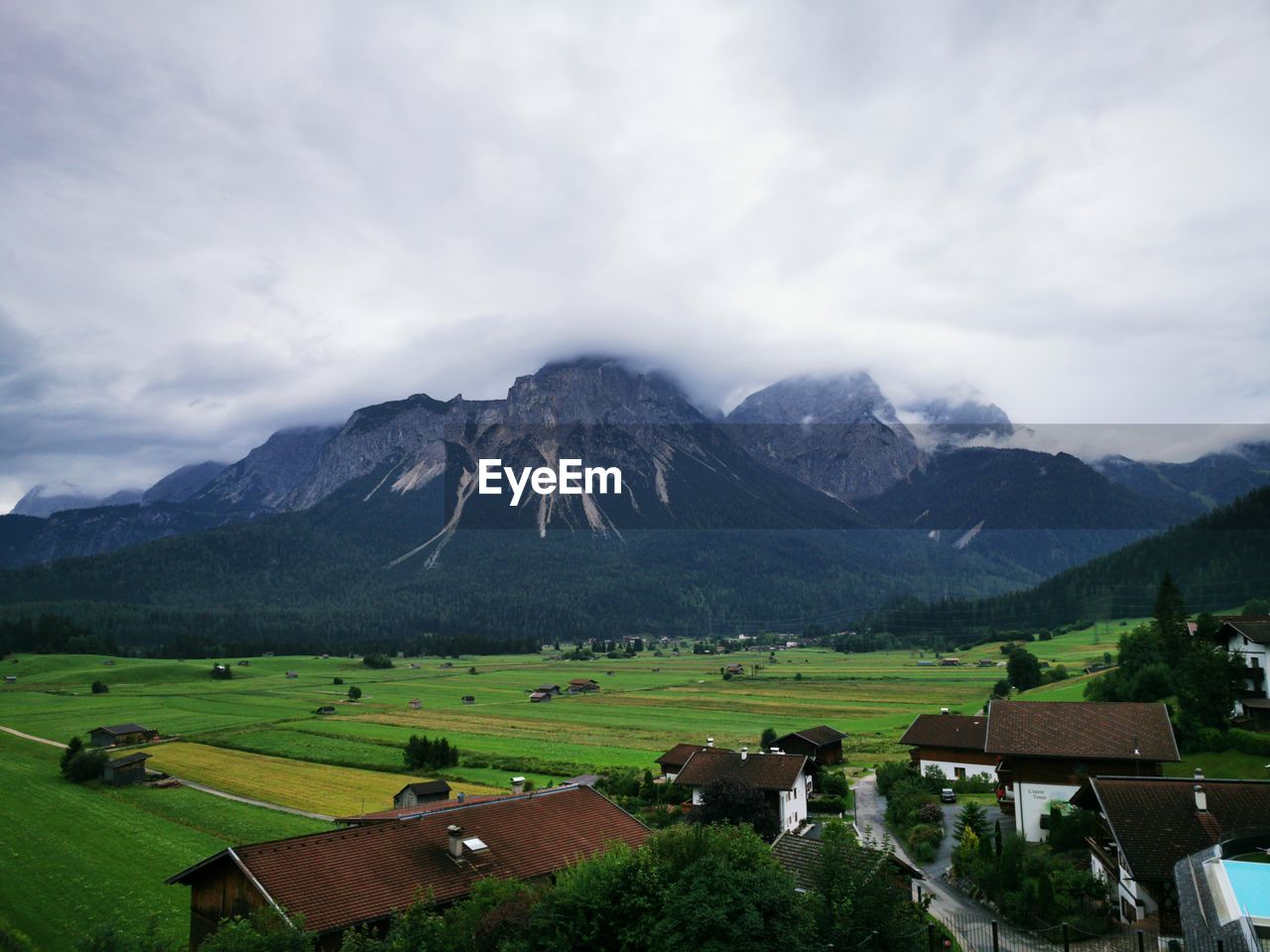 Scenic view of landscape and mountains against sky