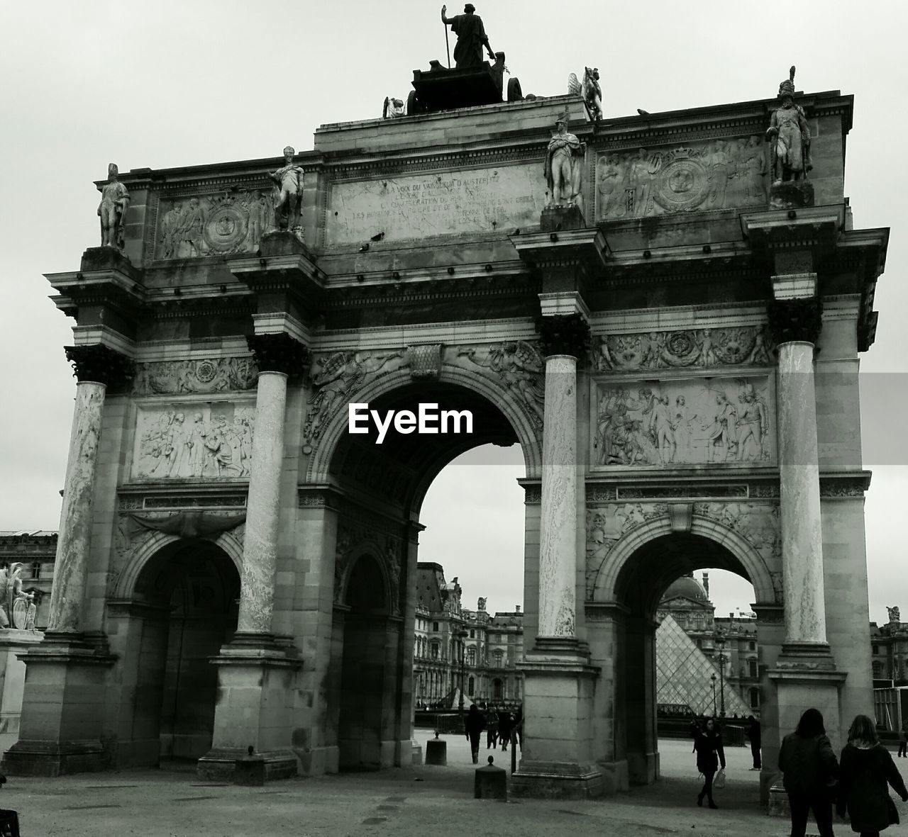 LOW ANGLE VIEW OF MONUMENT IN FRONT OF BUILDING