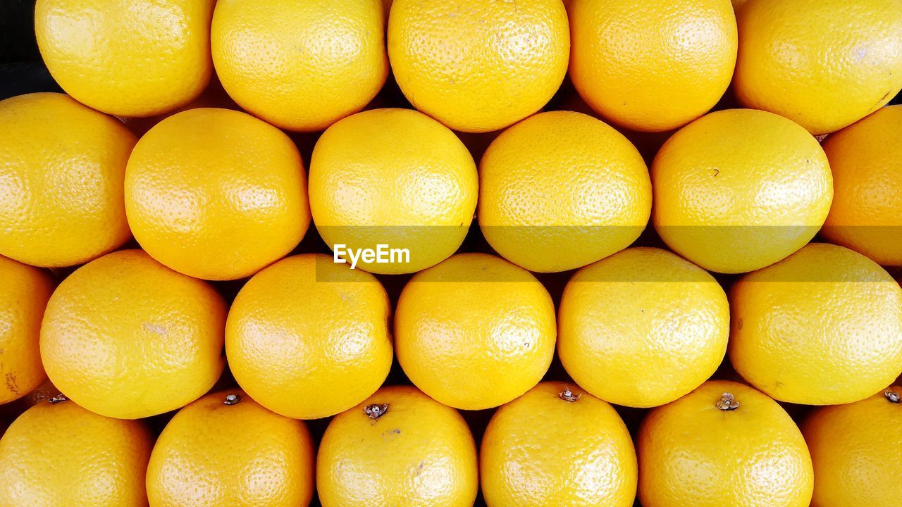 Full frame shot of oranges in market