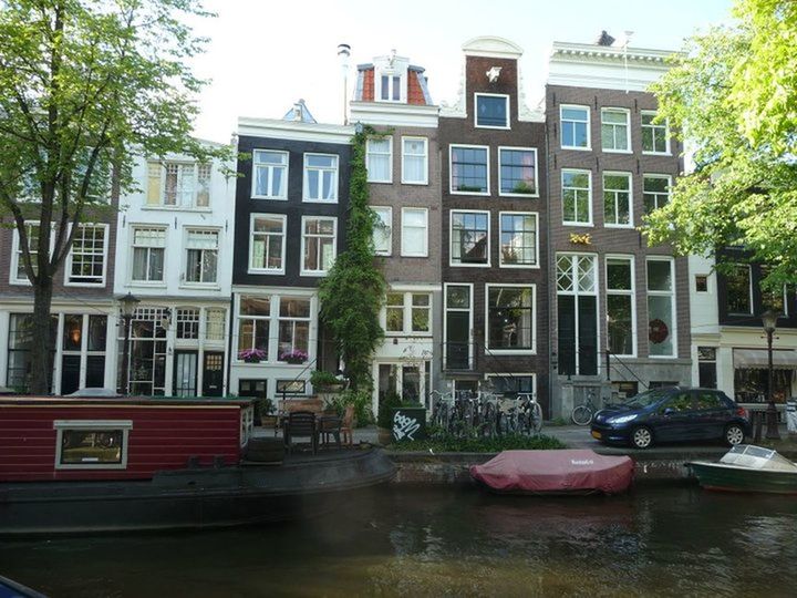 VIEW OF CANAL ALONG BUILDINGS