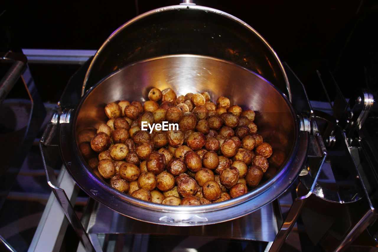 High angle view of prepared potatoes in utensil at kitchen