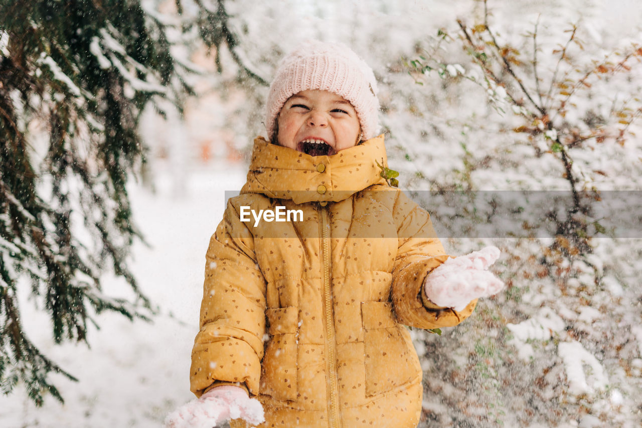 Portrait of boy in snow