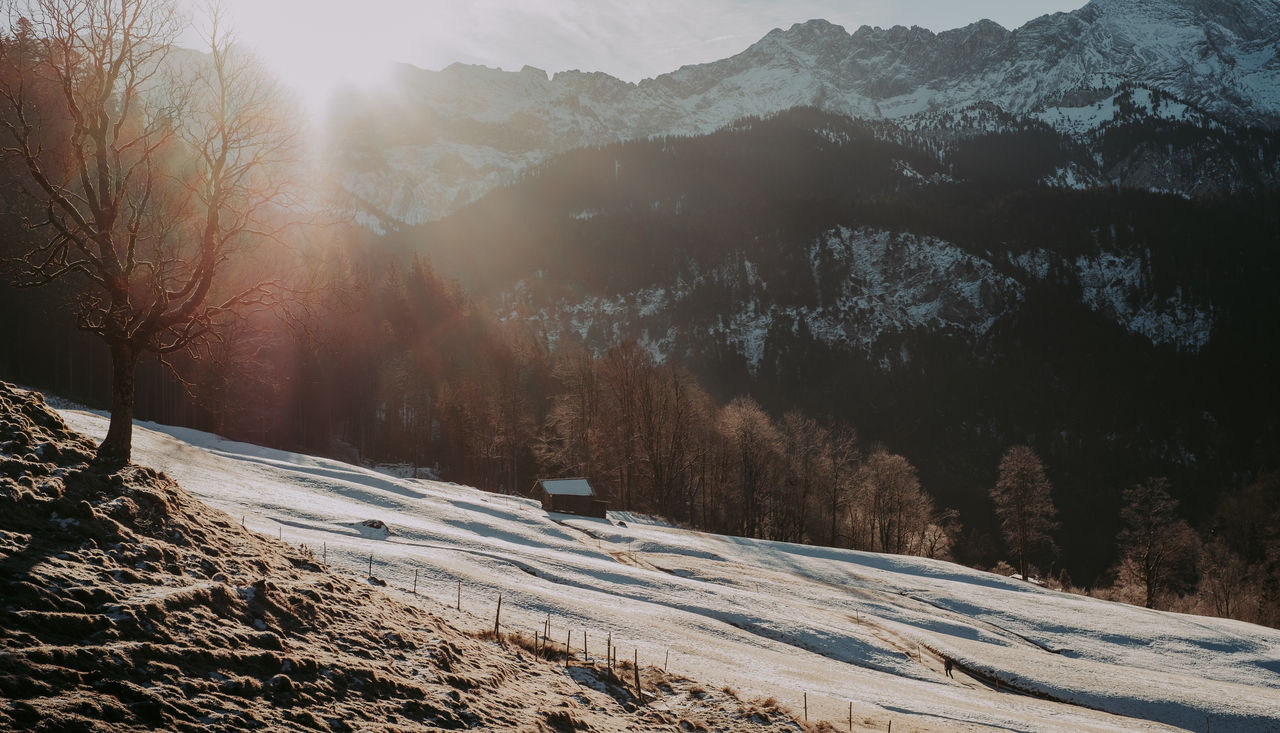 Scenic view of snow covered mountains