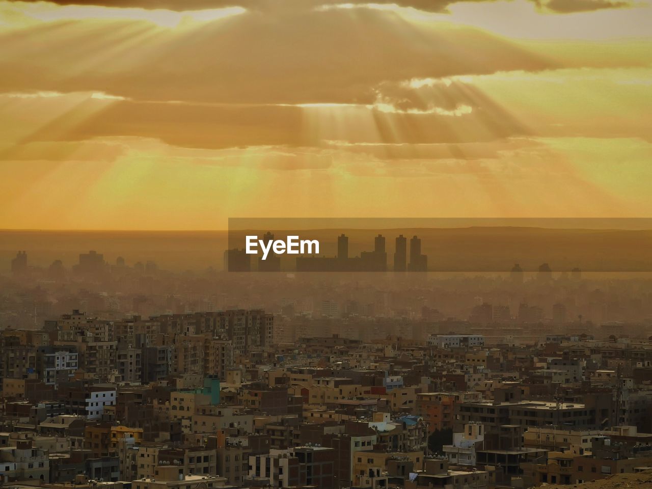 High angle view of townscape against sky during sunset