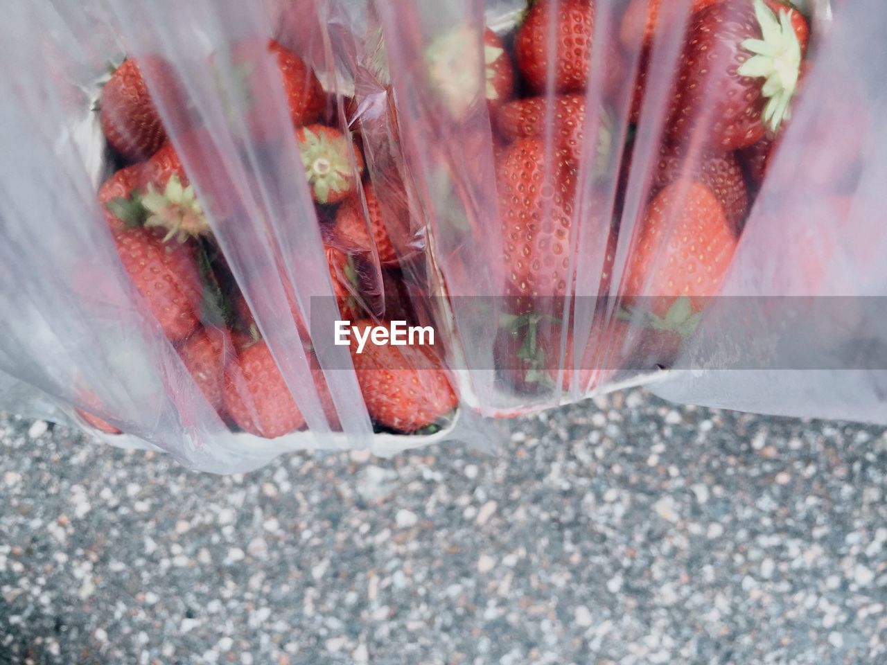 High angle view of strawberries in plastic bag