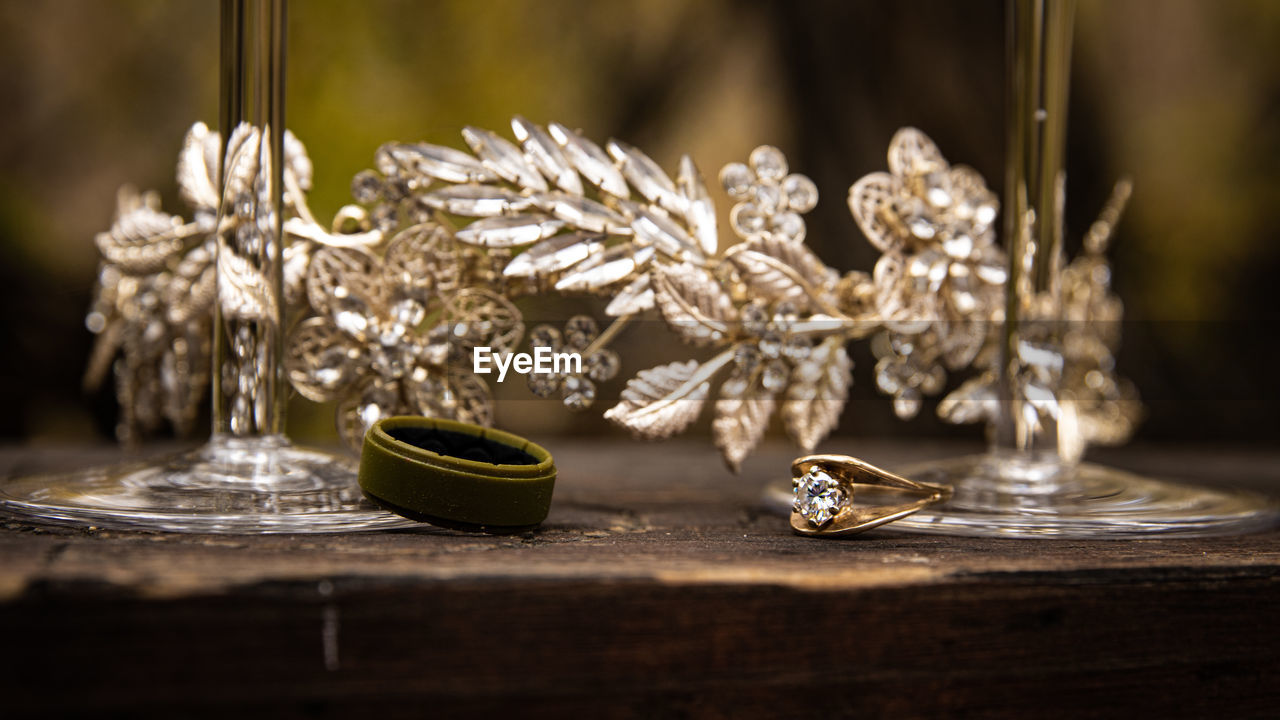 CLOSE-UP OF FLOWER ON TABLE