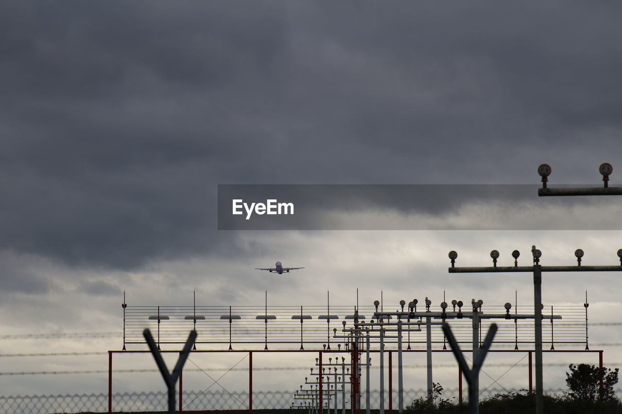 Low angle view of airplane flying in sky