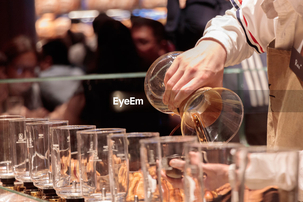 Close up of a barista pouring coffe in starbucks reserve roastery