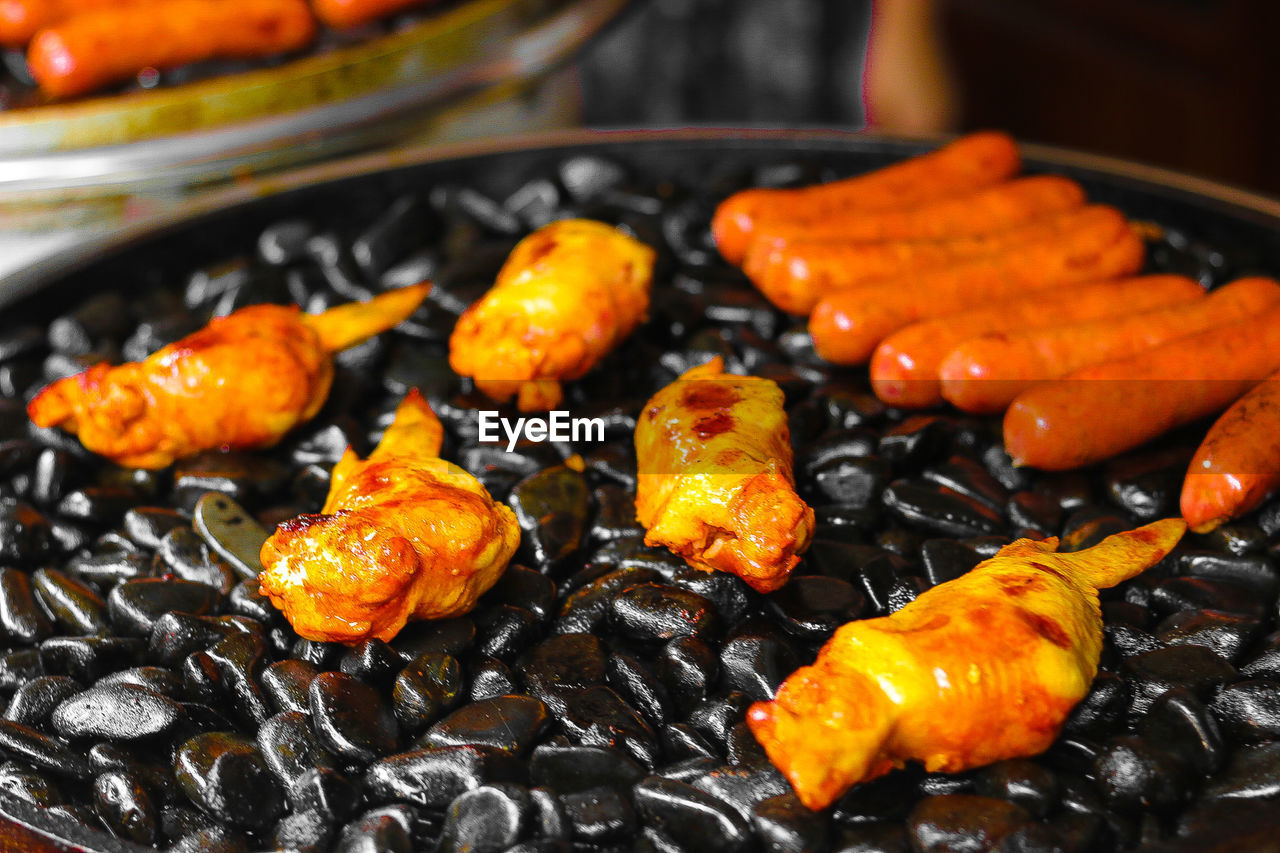 CLOSE-UP OF SEAFOOD ON BARBECUE