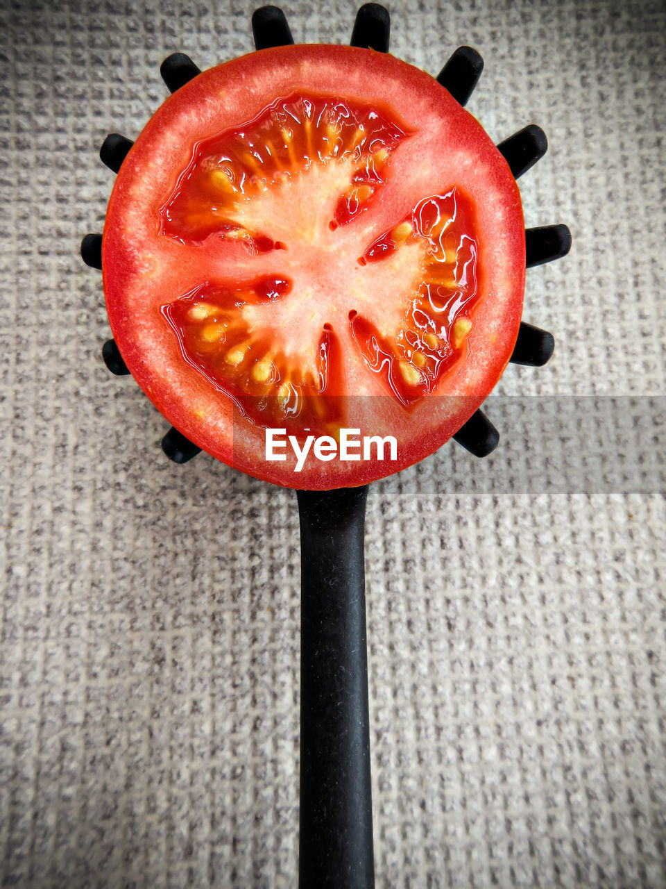 HIGH ANGLE VIEW OF RED FRUIT ON TABLE