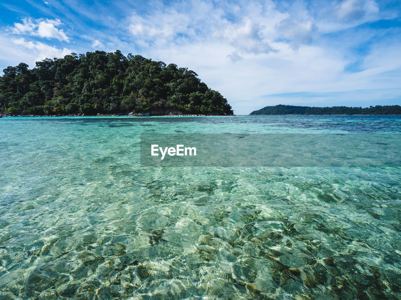 water, sea, land, sky, beauty in nature, scenics - nature, nature, ocean, beach, tranquility, island, shore, tranquil scene, turquoise colored, cloud, tropical climate, blue, reef, travel destinations, coast, idyllic, environment, travel, body of water, lagoon, landscape, vacation, holiday, trip, seascape, no people, sand, bay, tourism, outdoors, coral, day, tree, islet, tropics, sea life, archipelago, transparent, rock, coastline, underwater, summer, non-urban scene, cay, bay of water, undersea, plant, wind wave, mountain
