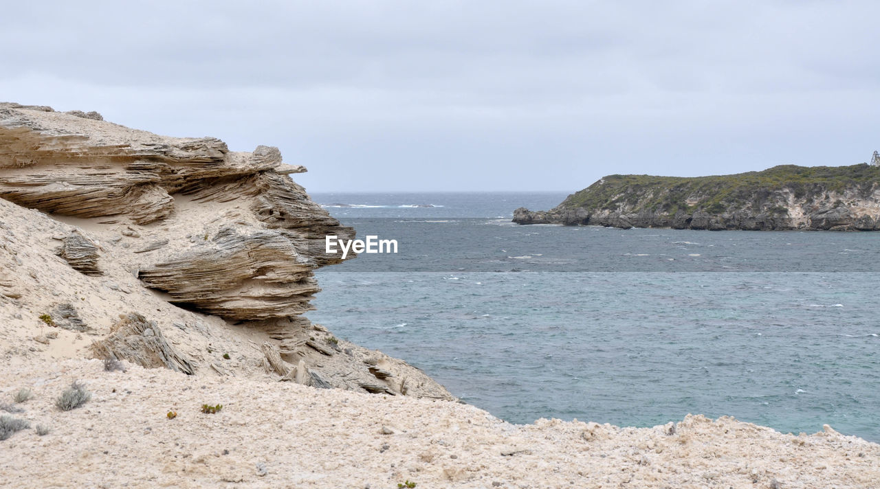 VIEW OF BEACH AGAINST SKY