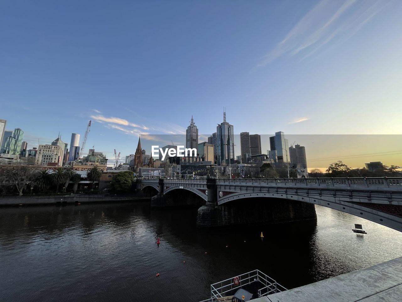 architecture, built structure, city, building exterior, sky, skyline, bridge, cityscape, travel destinations, building, water, urban skyline, landscape, reflection, landmark, nature, river, office building exterior, skyscraper, transportation, dusk, travel, city life, horizon, evening, no people, urban area, tourism, tower, sunset, outdoors, downtown, blue, downtown district, cloud, residential district, waterway