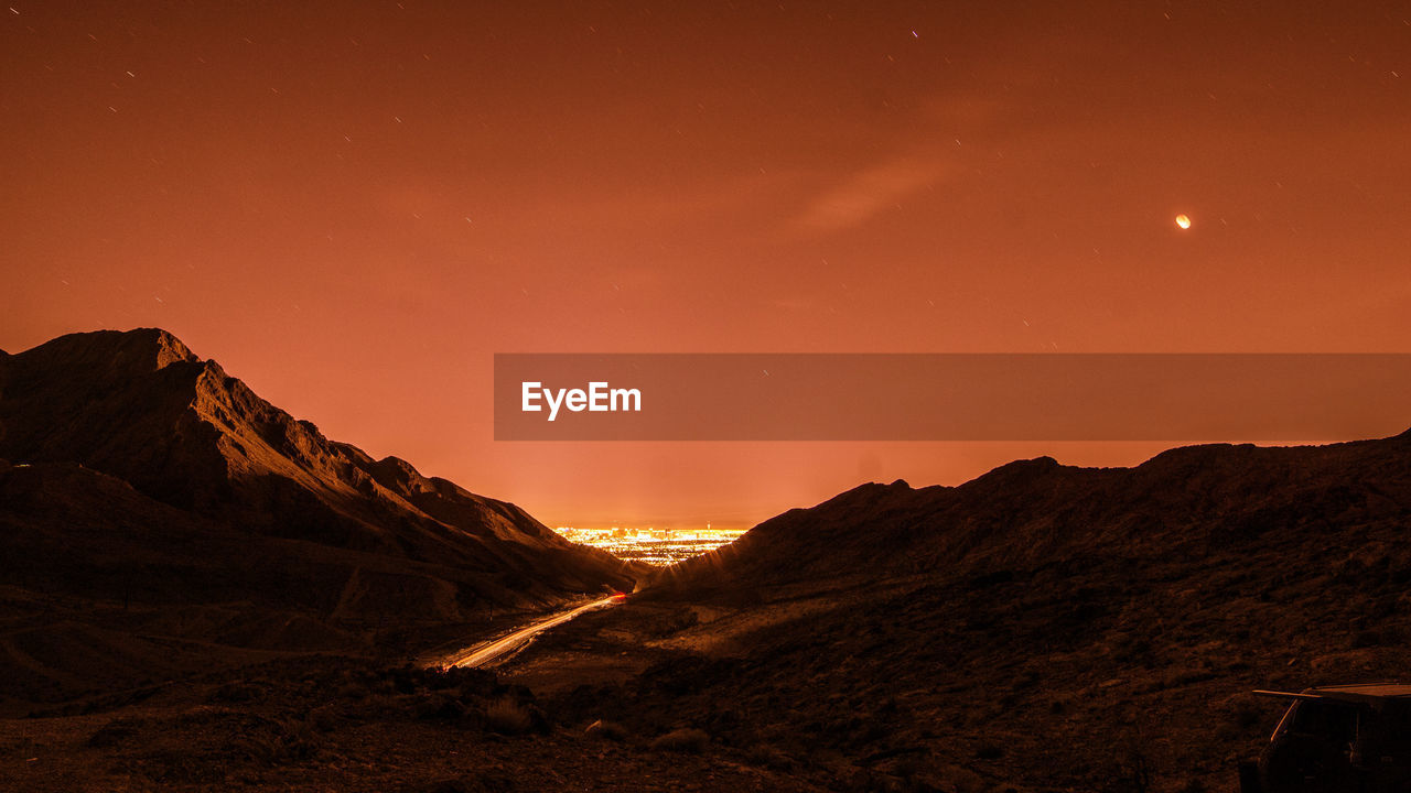 Scenic view of mountains against sky at night las vegas super moon