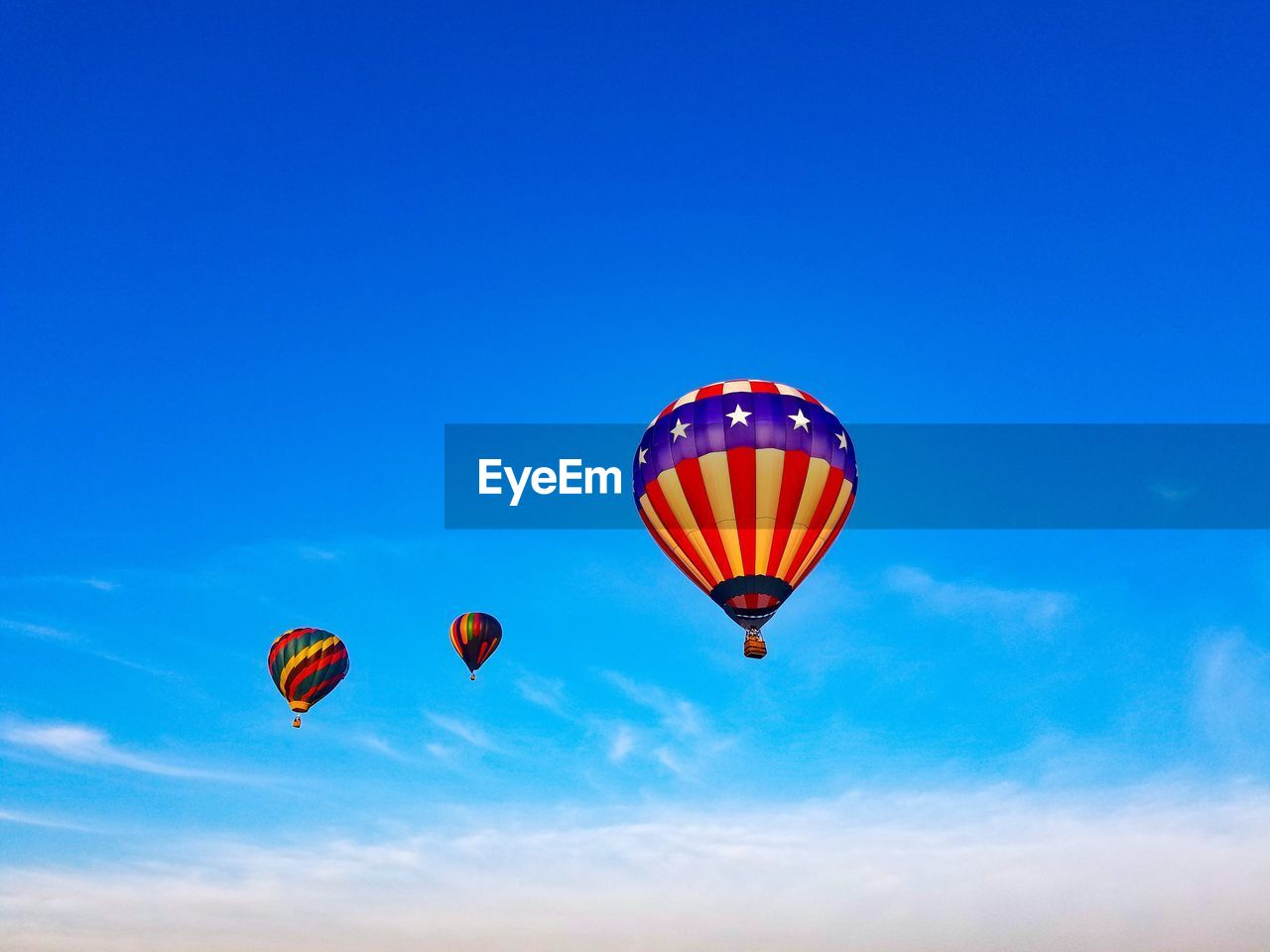 LOW ANGLE VIEW OF HOT AIR BALLOON AGAINST SKY