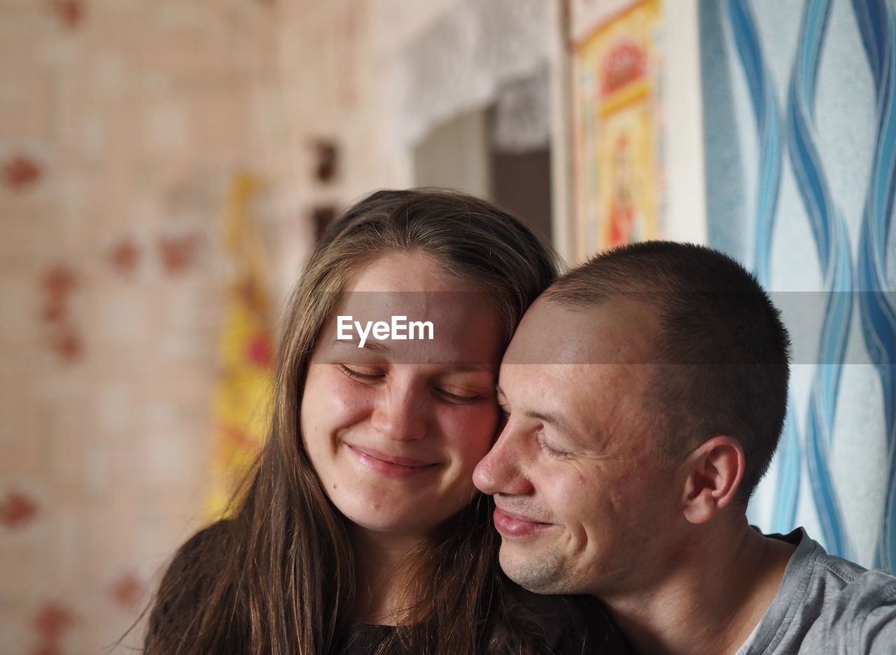 Love and affection between a young couple. lovely conversation and privacy. country style.