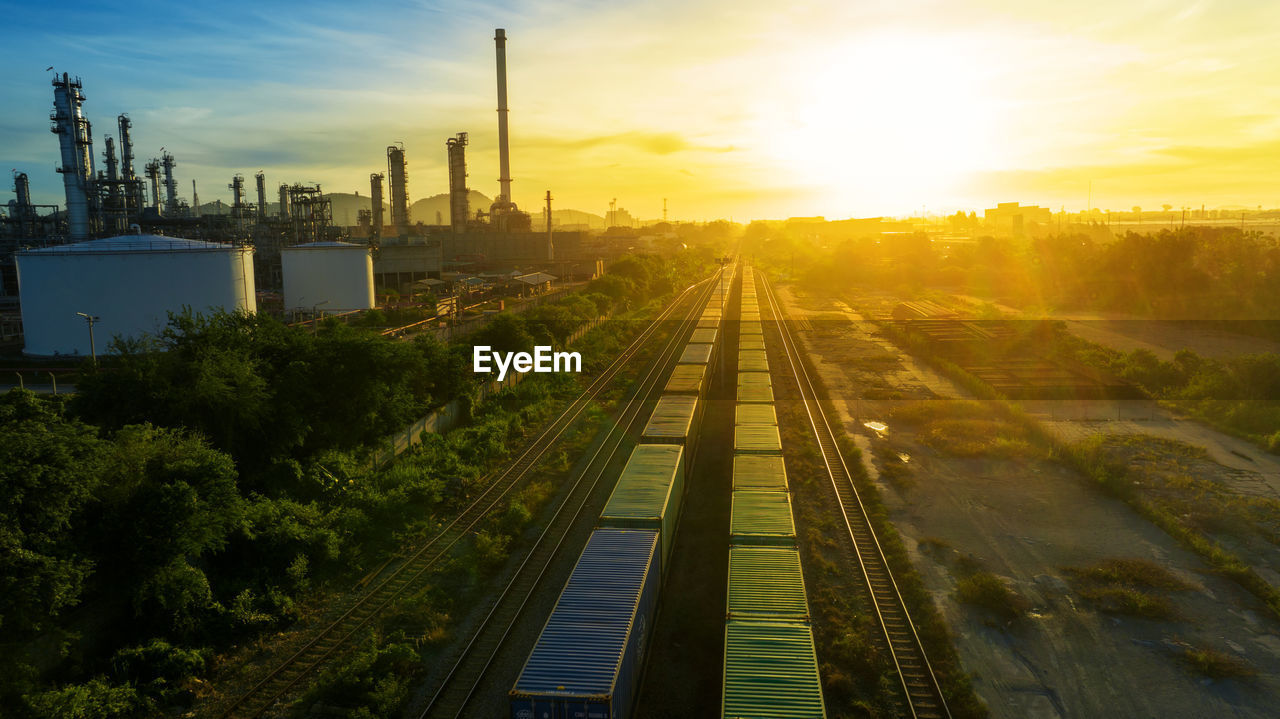 high angle view of railroad tracks at sunset