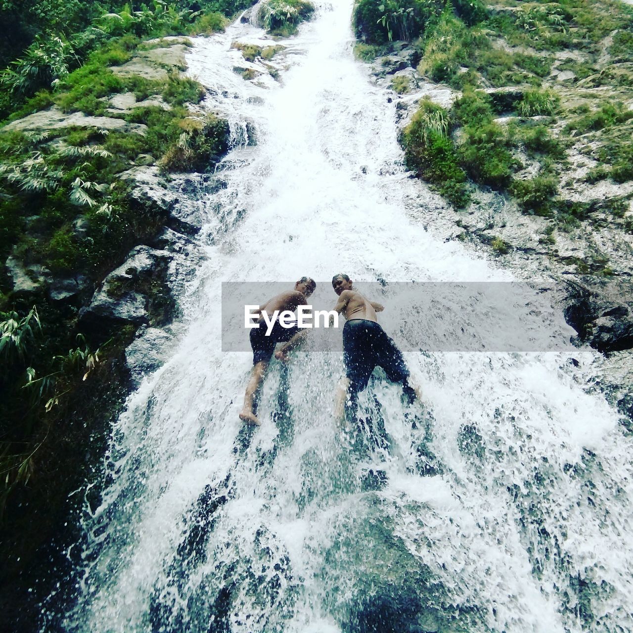 WOMAN SPLASHING WATER