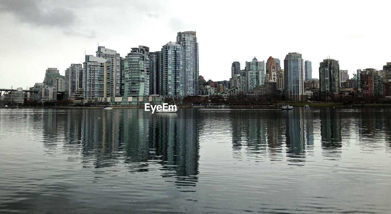 REFLECTION OF CITY ON WATER