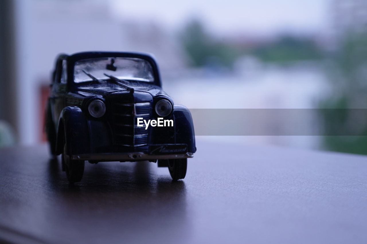 Close-up of toy car on table