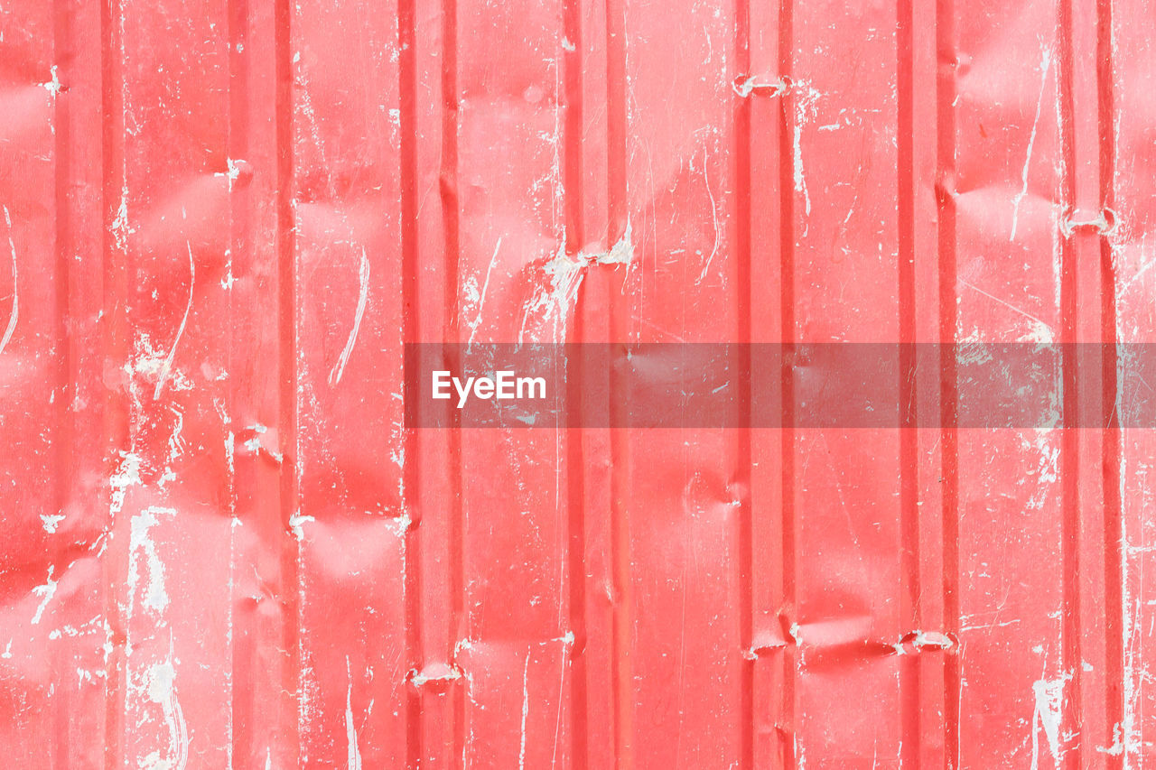 FULL FRAME SHOT OF WEATHERED RED WALL
